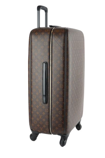LOUIS VUITTON
Louis Vuitton rolling suitcase...