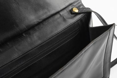 CLUTCH
Black leather evening clutch with...