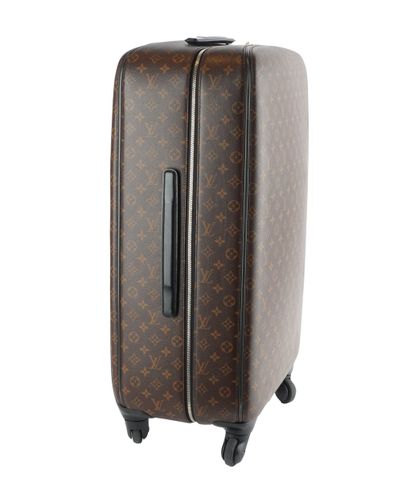 LOUIS VUITTON
Louis Vuitton rolling suitcase...