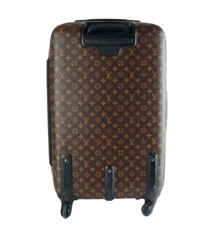 LOUIS VUITTON
Louis Vuitton rolling suitcase...