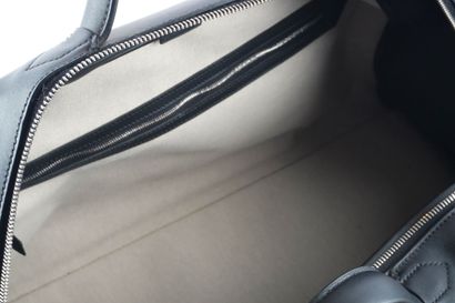 HERMÈS 
Hermès travel bag in gray canvas...