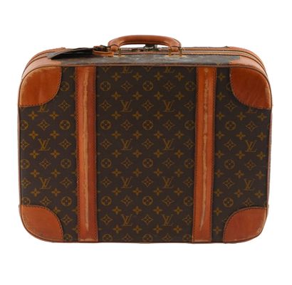 LOUIS VUITTON
Vintage Louis Vuitton suitcase...