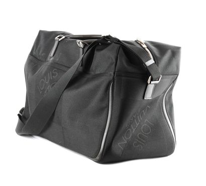 LOUIS VUITTON
Louis Vuitton travel shoulder...