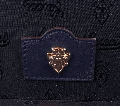GUCCI
Gucci trunk in Monogam GG canvas and...