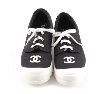 CHANEL
Chanel sneakers in black and white...