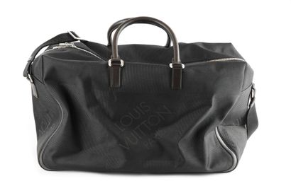LOUIS VUITTON
Louis Vuitton travel shoulder...
