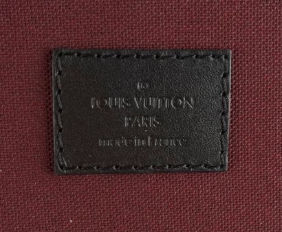 LOUIS VUITTON
Louis Vuitton rolling travel...