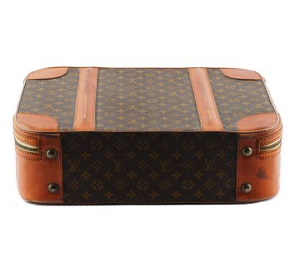 LOUIS VUITTON
Vintage Louis Vuitton suitcase...