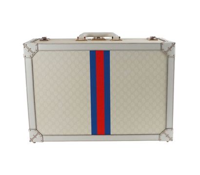 GUCCI
Gucci trunk in Monogam GG canvas and...