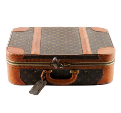 LOUIS VUITTON
Vintage Louis Vuitton suitcase...