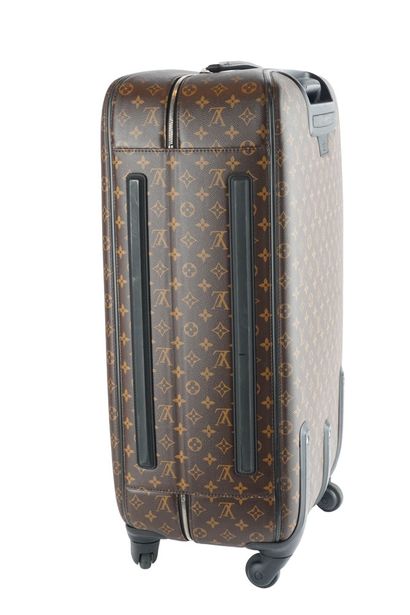 LOUIS VUITTON
Louis Vuitton rolling suitcase...