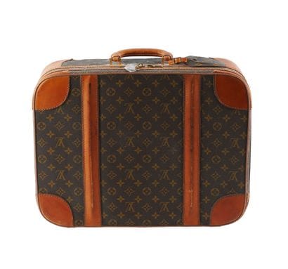LOUIS VUITTON
Vintage Louis Vuitton suitcase...
