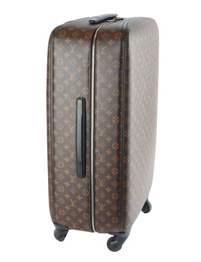 LOUIS VUITTON
Louis Vuitton rolling suitcase...