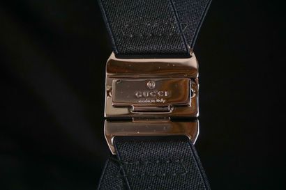 GUCCI
Gucci monogram leather rolling suitcase...