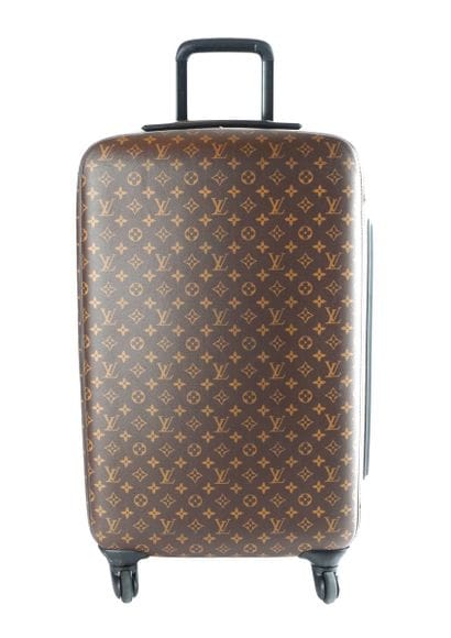 LOUIS VUITTON
Louis Vuitton rolling suitcase...