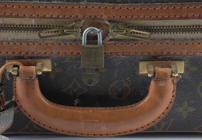 LOUIS VUITTON
Vintage Louis Vuitton suitcase...
