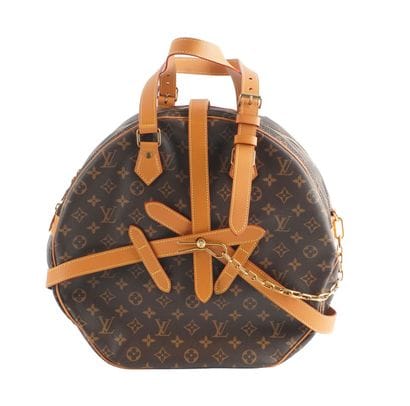 LOUIS VUITTON
Louis Vuitton hat chest bag...