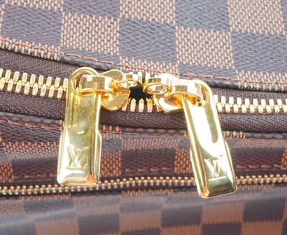 LOUIS VUITTON
Louis Vuitton rolling duffel...
