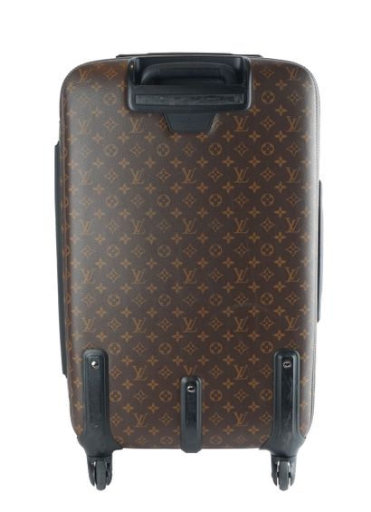 LOUIS VUITTON
Louis Vuitton rolling suitcase...