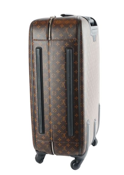 LOUIS VUITTON
Louis Vuitton rolling suitcase...