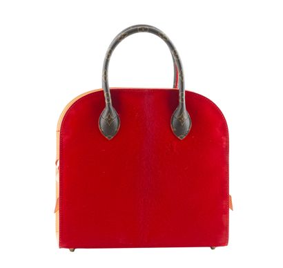LOUIS VUITTON x CHRISTIAN LOUBOUTIN
Louis...
