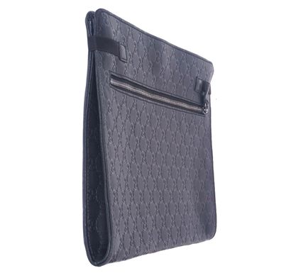 GUCCI
Large Gucci clutch in black Monogrammed...