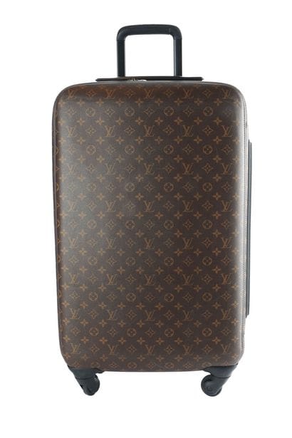 LOUIS VUITTON
Louis Vuitton rolling suitcase...