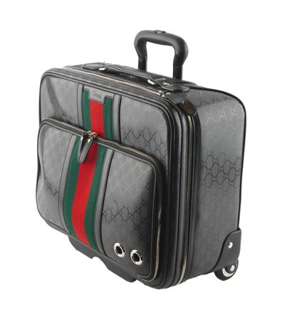 GUCCI
Gucci rolling cabien bag in Monogram...