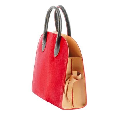 LOUIS VUITTON x CHRISTIAN LOUBOUTIN
Louis...