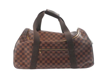 LOUIS VUITTON
Louis Vuitton rolling duffel...