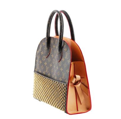 LOUIS VUITTON x CHRISTIAN LOUBOUTIN
Louis...