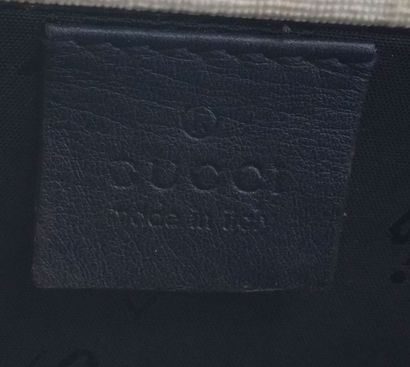 GUCCI
Gucci trunk in Monogam GG canvas and...