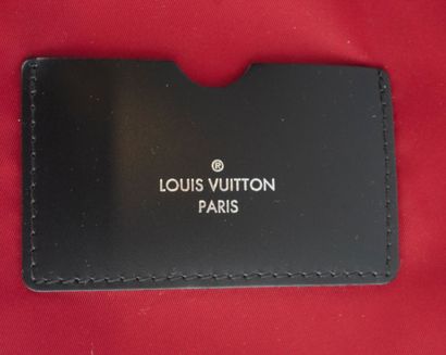LOUIS VUITTON
Louis Vuitton rolling suitcase...