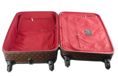 LOUIS VUITTON
Louis Vuitton rolling suitcase...