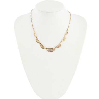 OR 18K / 18K GOLD
Coller draperie en or jaune...