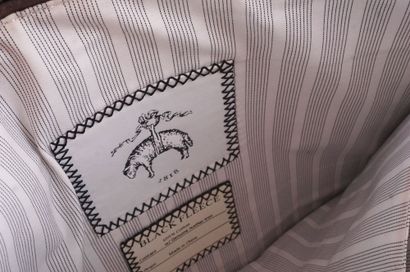 BLACK FLEECE
Lot comprenant deux pochettes...