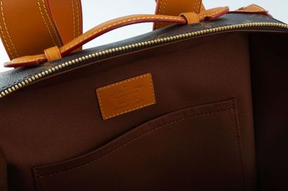 LOUIS VUITTON
Sac à dos, boîte à chaussures...