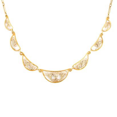 OR 18K / 18K GOLD
Coller draperie en or jaune...