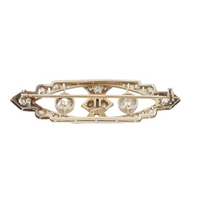 OR 18K, DIAMANTS / 18K GOLD, DIAMONDS
Broche...