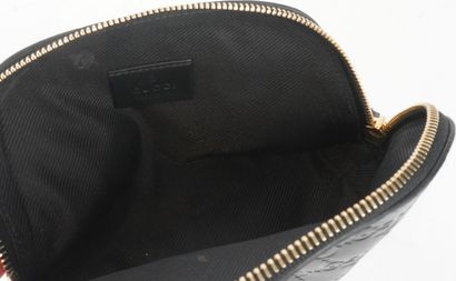GUCCI
Petite pochette Gucci en cuir noir...