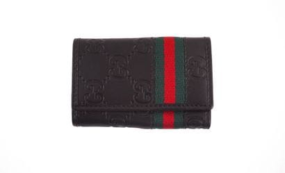 GUCCI
Gucci Monogram brown leather key ring...