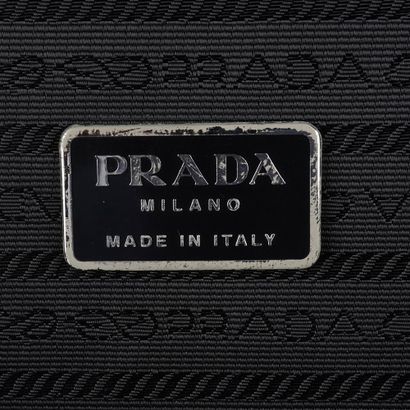 PRADA
Valise Prada en toile et cuir noir,...