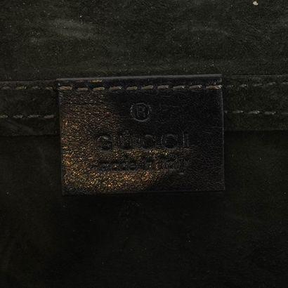 GUCCI
Pochette -étui Gucci en cuir noir,...