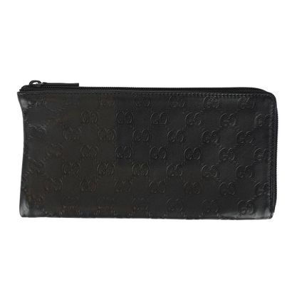 GUCCI
Pochette Gucci en cuir noir Guccissimma
H:...
