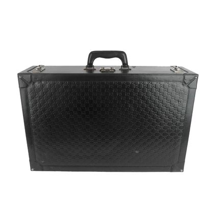 GUCCI
Malle vintage noire Gucci pour homme,...