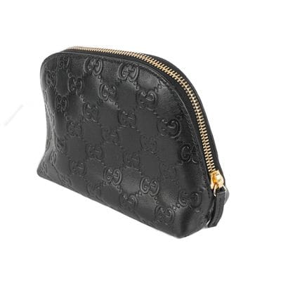 GUCCI
Petite pochette Gucci en cuir noir...