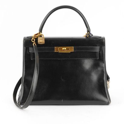 HERMÈS
Sac vintage Hermès Kelly en cuir noir,...