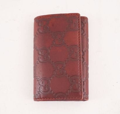 GUCCI
Gucci Monogram brown leather key ring...
