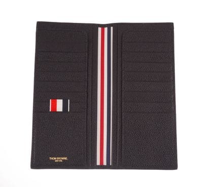 THOM BROWNE
Thom Browne black leather wallet...