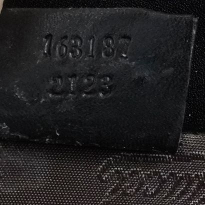 GUCCI
Malle vintage noire Gucci pour homme,...
